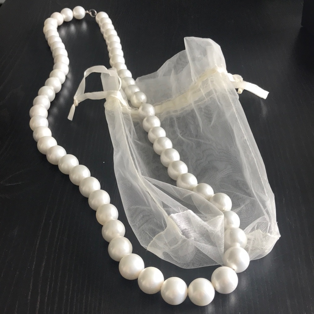 Long Strand Pearl Necklace